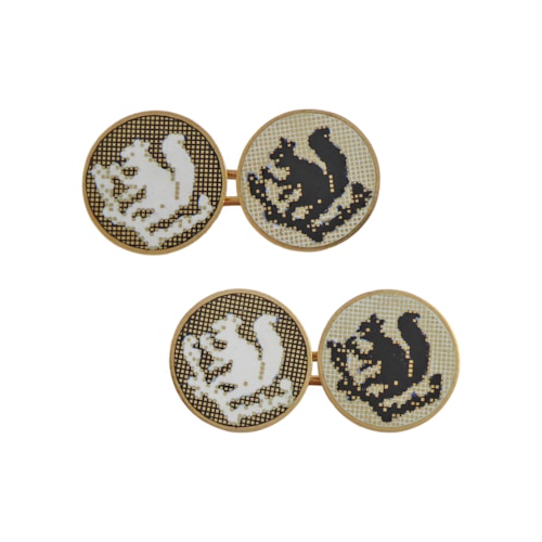 Pair of Art Deco black and white enamelled gold cufflinks, French, with squirrel motifs,